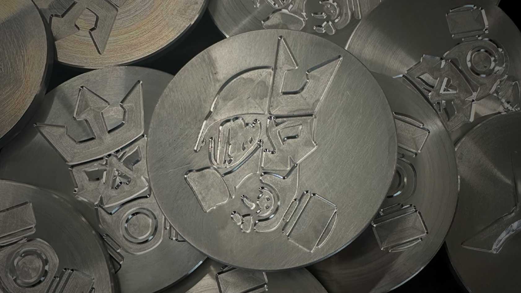 Machined Ruthless Manufacturing logo plates